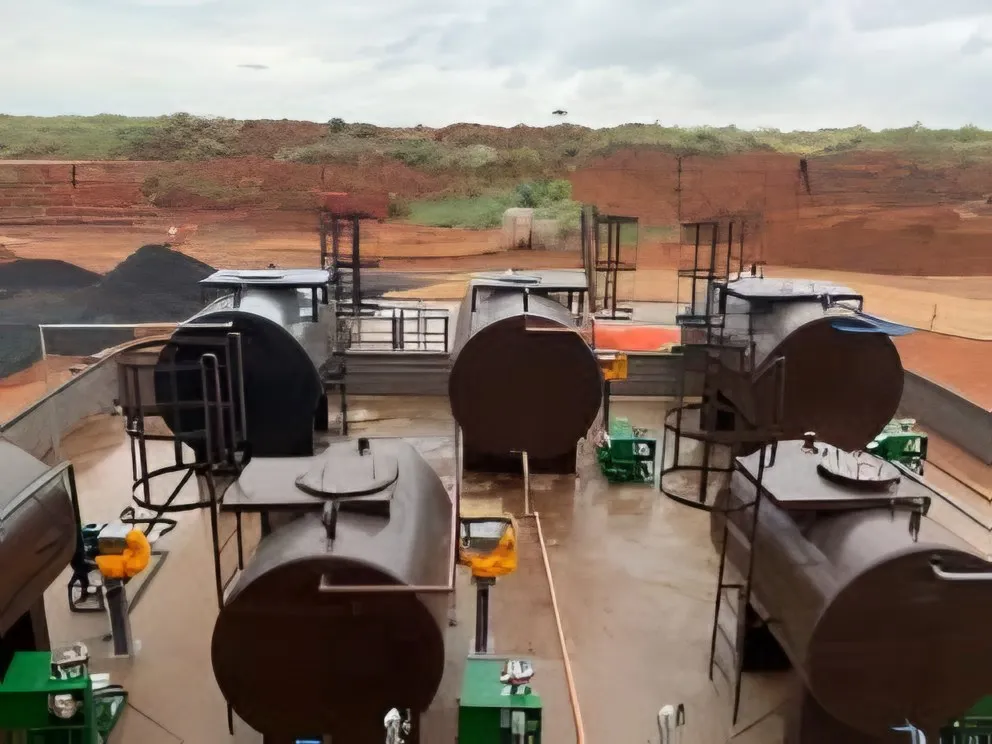 Row of bulk oil tanks in a bunded area at a mine site